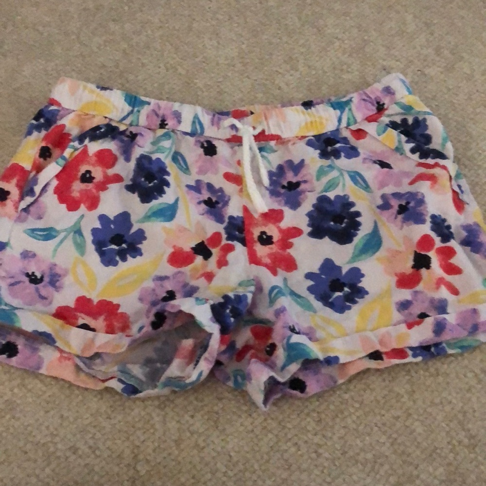 Floral jean shorts with a white tie